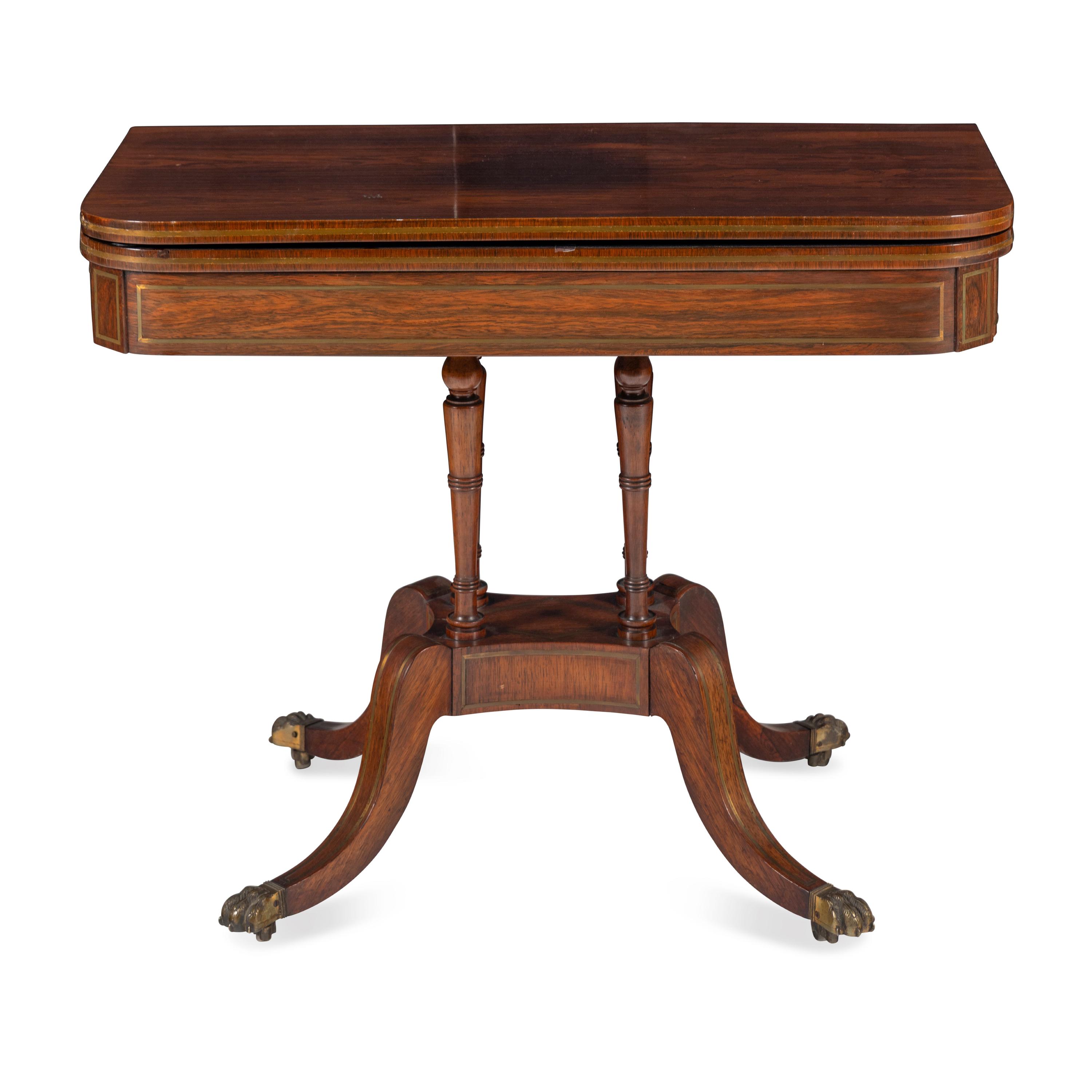 A Regency Rosewood and Brass Inlaid Game Table