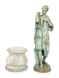 A Painted Cast Iron Diana of Gabii on a Carved Stone Base