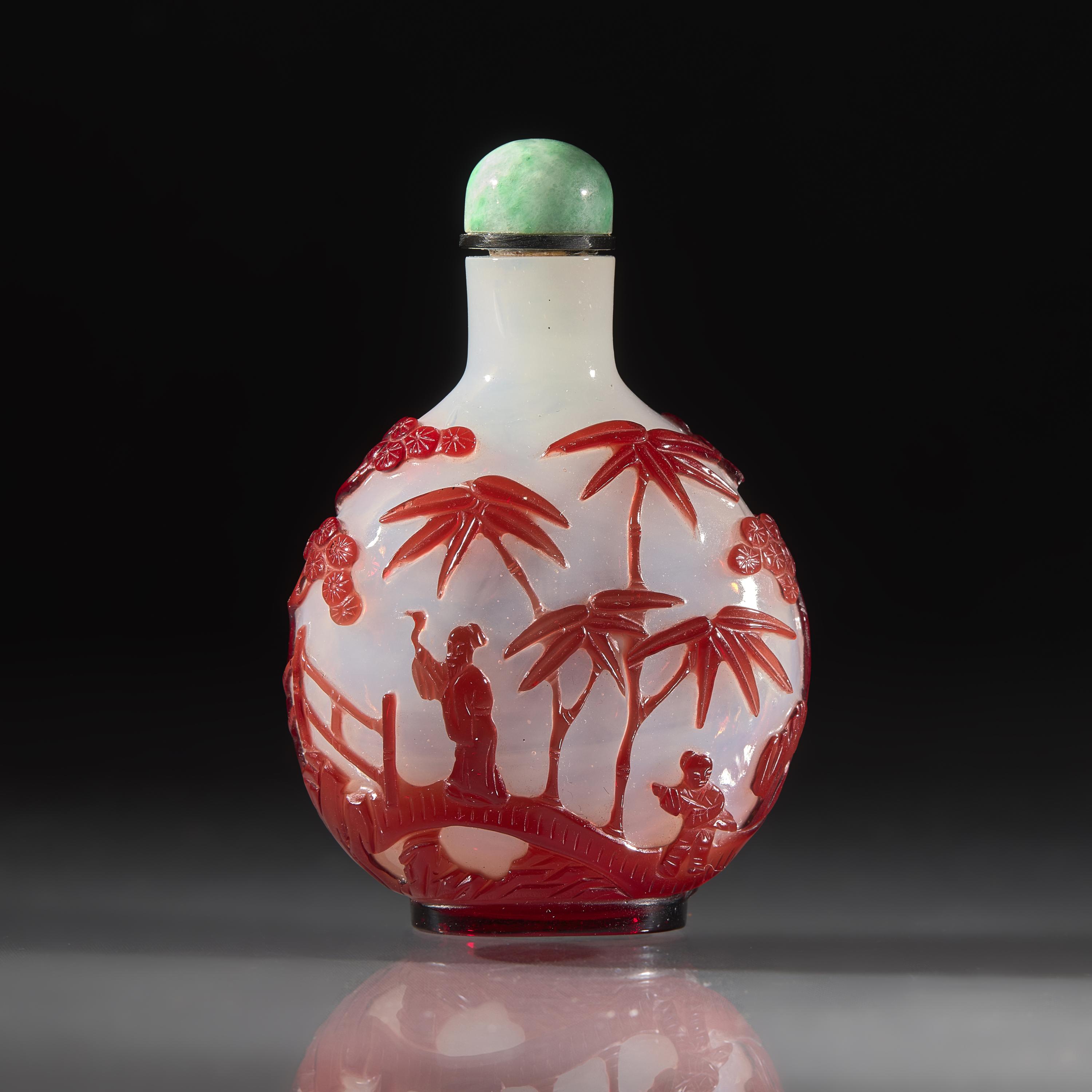 A Chinese Ruby Overlay Glass, Snuff Bottle, Qing Dynasty, 18th/Early 19th Century — 清中期 白地套寶石紅料人物圖鼻煙壺
