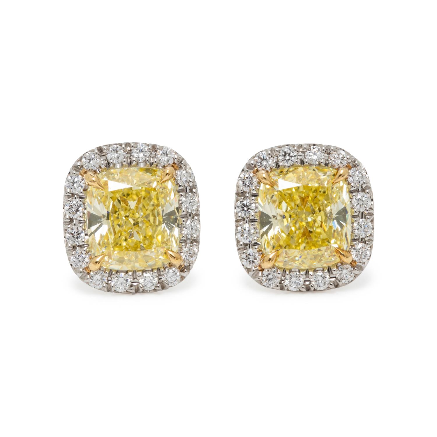 TIFFANY & CO., 'SOLESTE' FANCY INTENSE YELLOW DIAMOND AND DIAMOND STUD EARRINGS