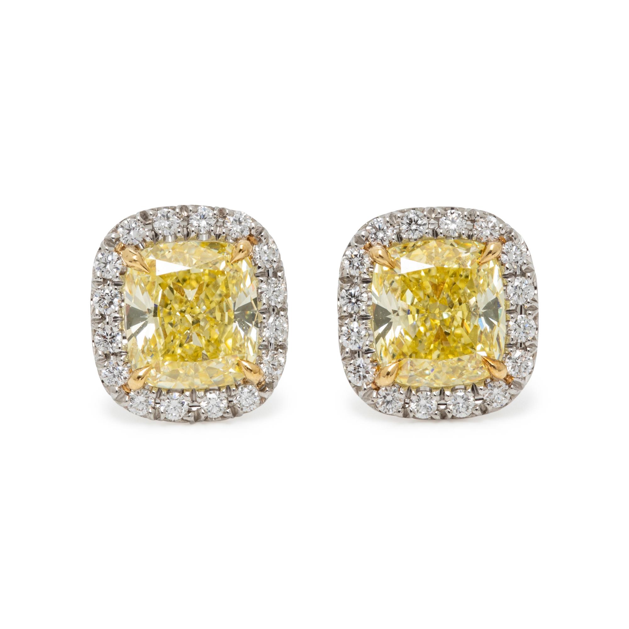 TIFFANY & CO., 'SOLESTE' FANCY INTENSE YELLOW DIAMOND AND DIAMOND STUD EARRINGS