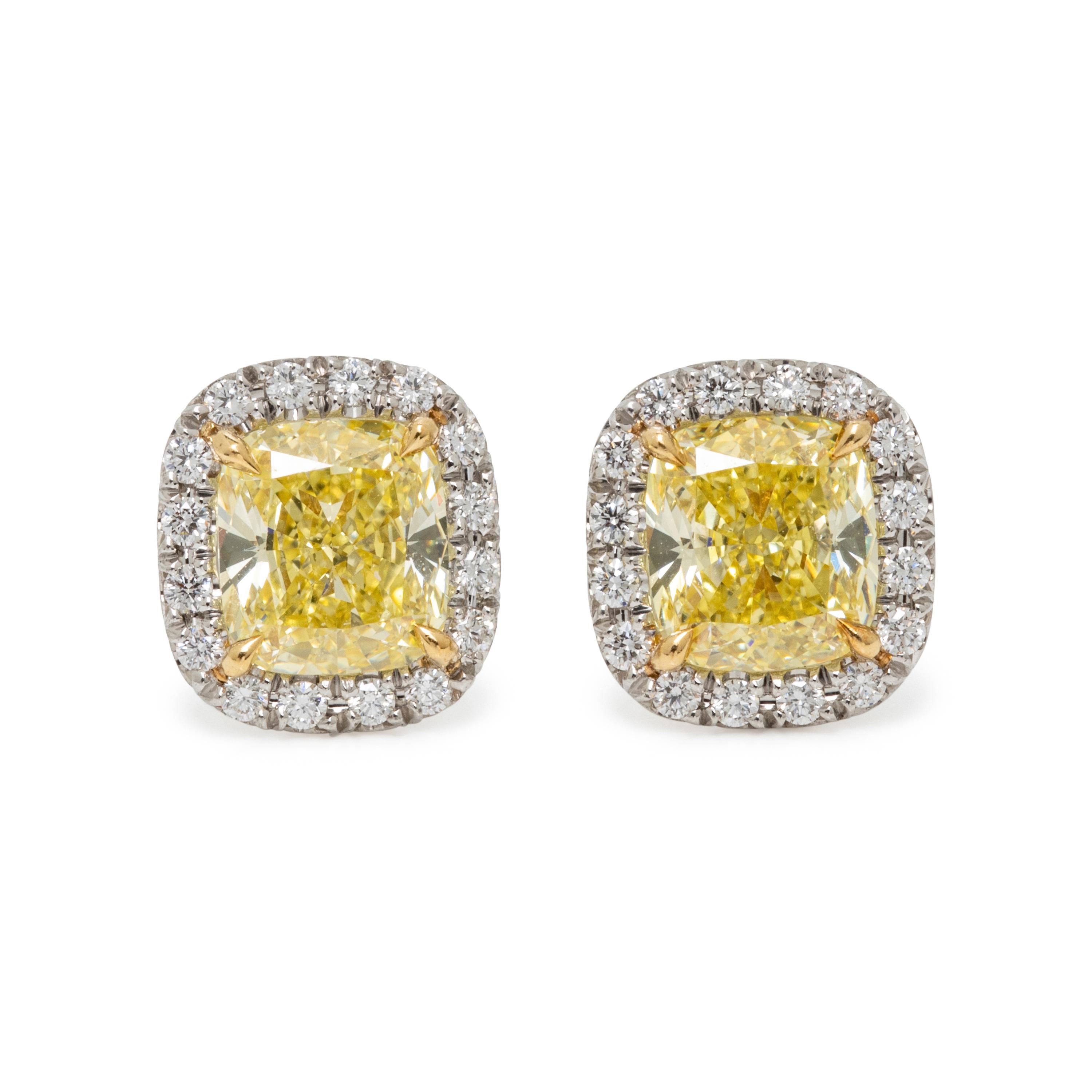 TIFFANY & CO., 'SOLESTE' FANCY INTENSE YELLOW DIAMOND AND DIAMOND STUD EARRINGS