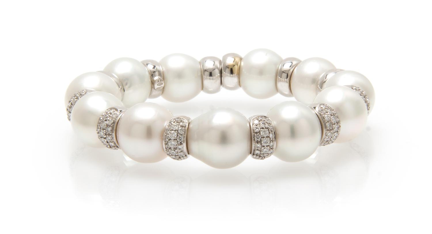 An 18 Karat White Gold, Diamond and Cultured South Sea Pearl Bracelet, Italian, 51.50 dwts.