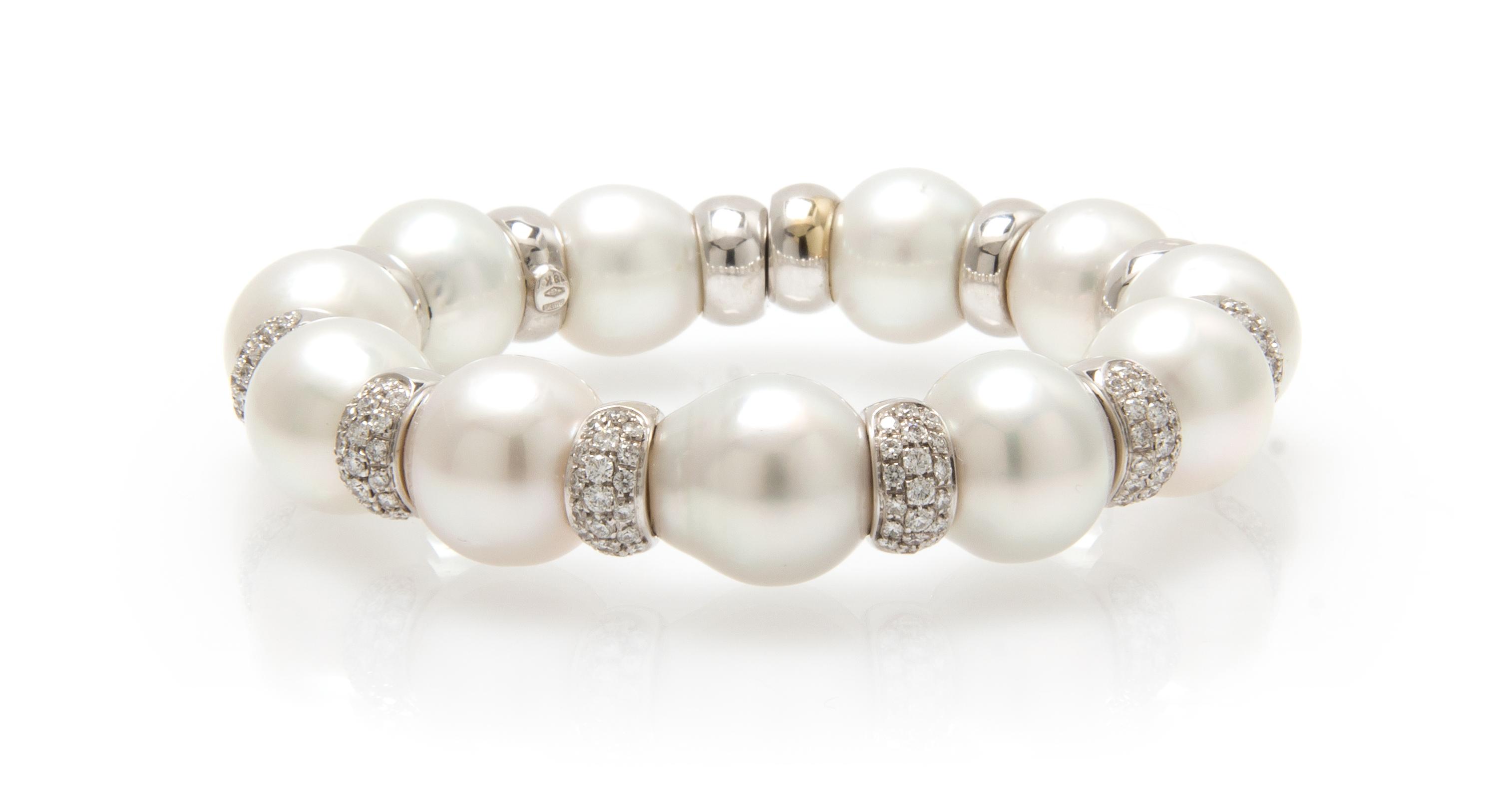 An 18 Karat White Gold, Diamond and Cultured South Sea Pearl Bracelet, Italian, 51.50 dwts.