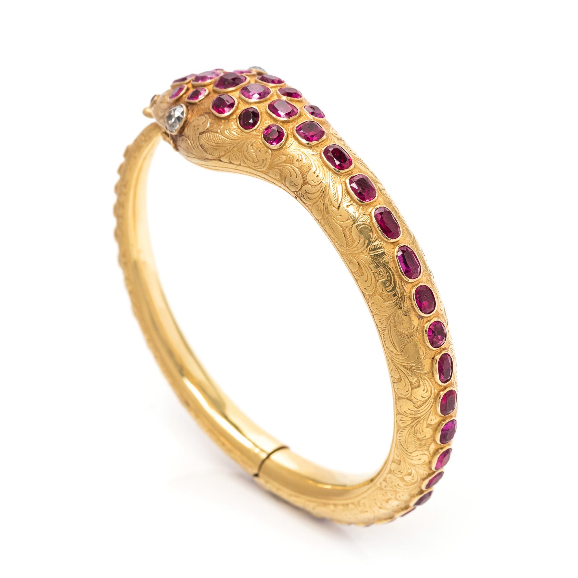 A Victorian Yellow Gold, Ruby, and Diamond Ouroboros Snake Bangle Bracelet,