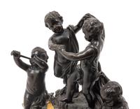 A French Gilt and Patinated Bronze Figural Mantel Clock