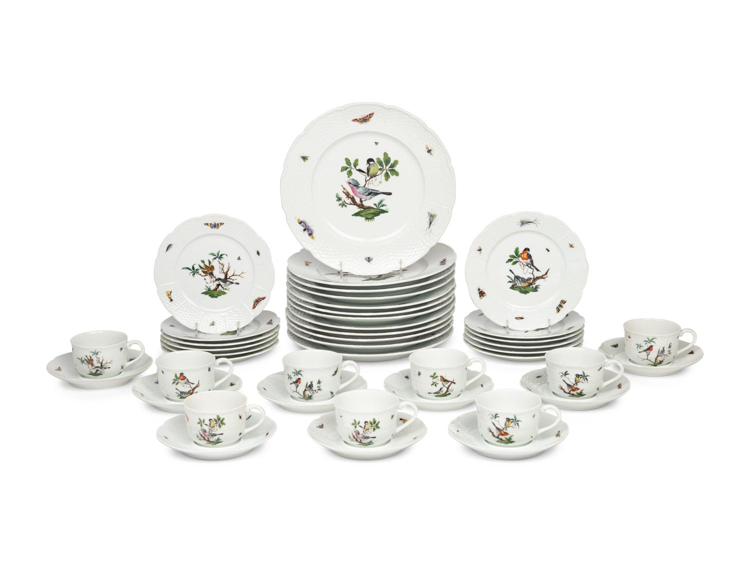 A Raynaud Limoges Porcelain Dinner Service