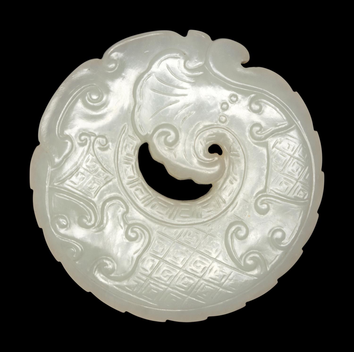 A Carved White Jade 'Dragon' Pendant