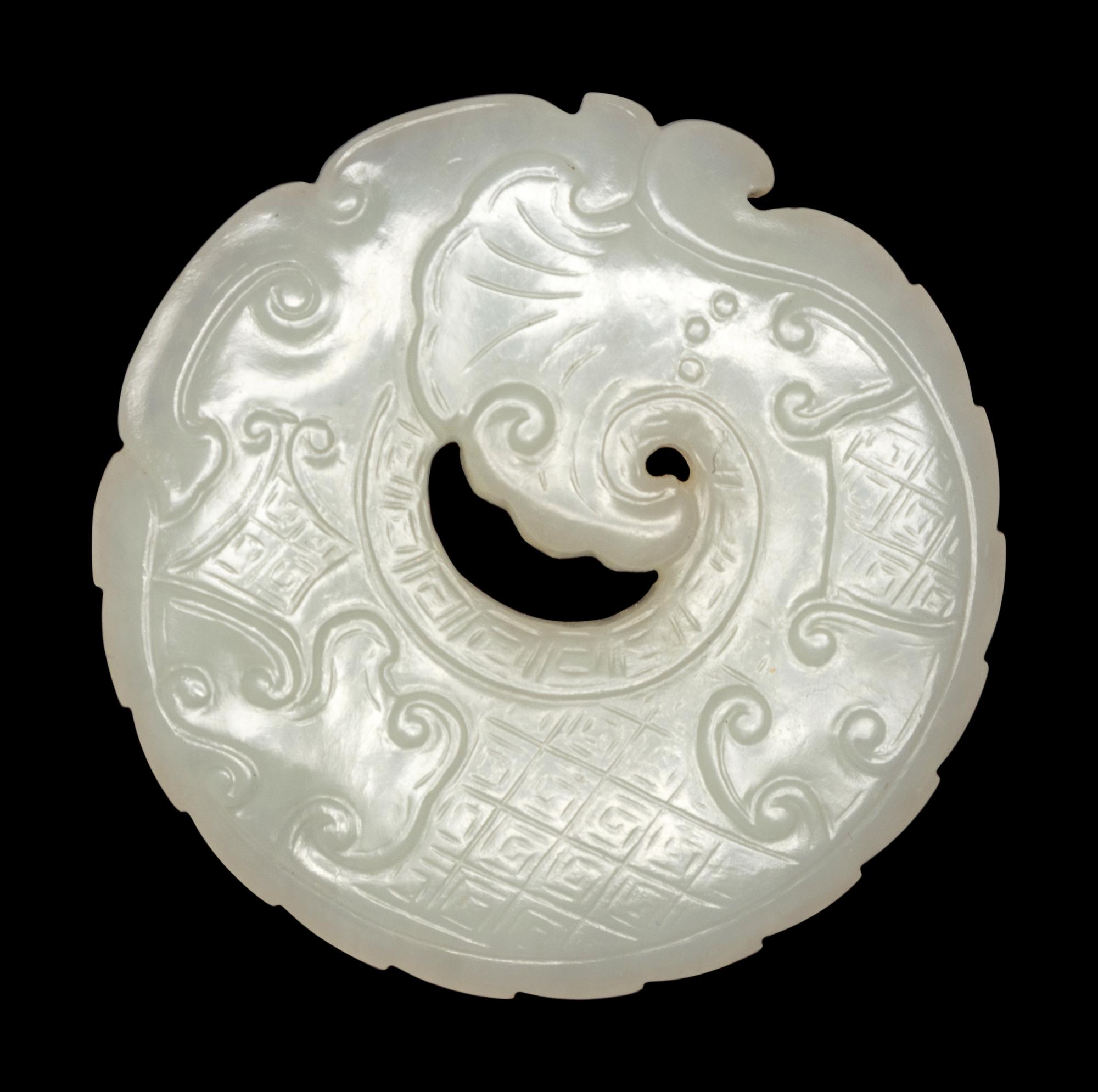 A Carved White Jade 'Dragon' Pendant