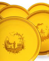 A Set of Fourteen Limoges Porcelain Plates