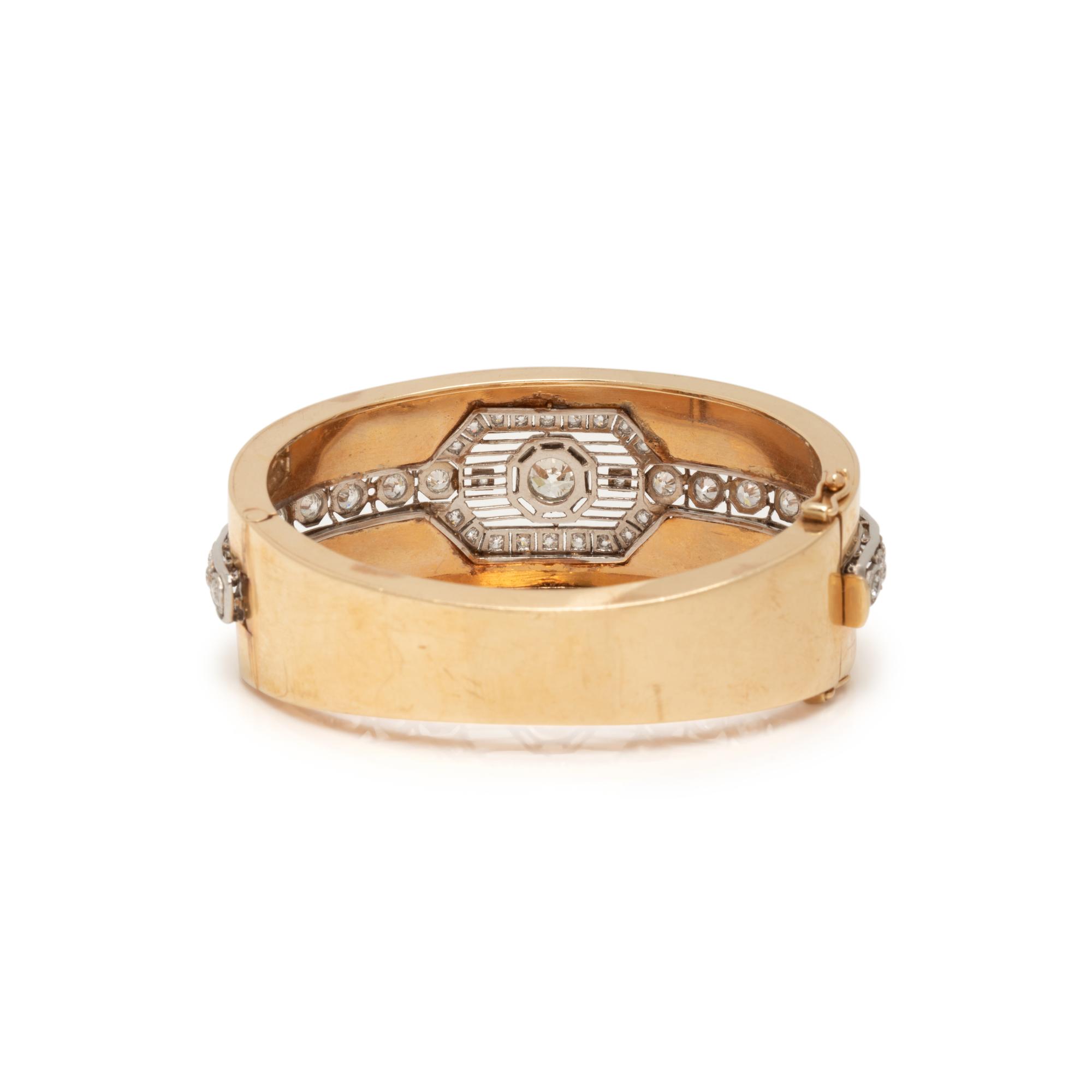 YELLOW GOLD, PLATINUM AND DIAMOND BANGLE BRACELET
