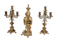 A Continental Gilt Bronze Three-Piece Clock Garniture