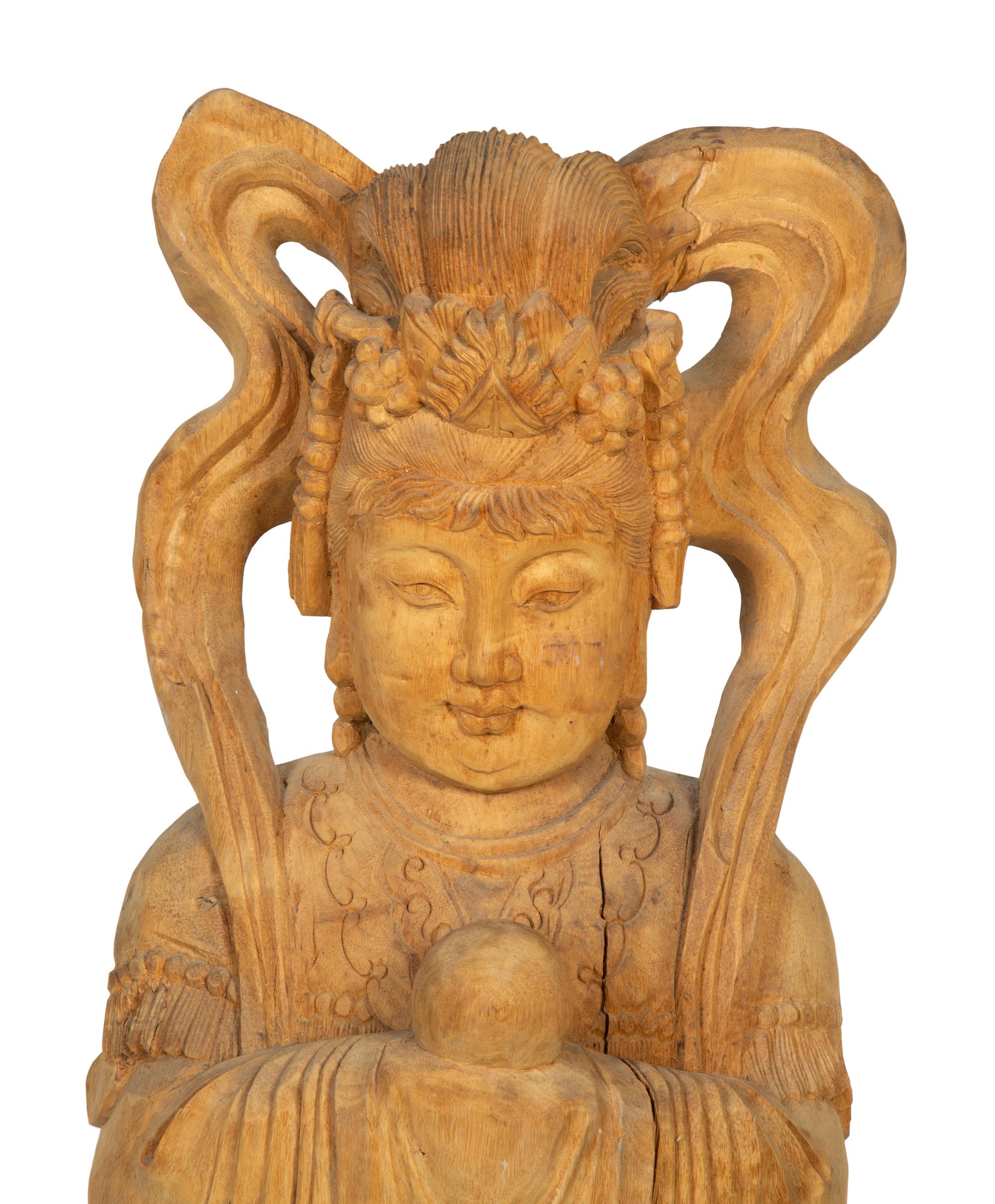 A Carved Wood Figure of Guanyin