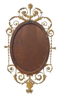 An Oval Giltwood Looking Glass