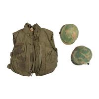 Group of Two Vietnam Era M1 Helmets and Flak Jacket
