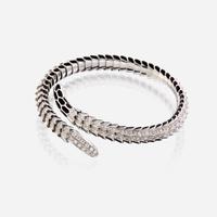 An eighteen karat white gold, diamond, and enamel bangle, Roberto Coin