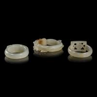 Nine Chinese Pale Celadon Jade Loop-Form Pendants and Three Rings, 20th Century — 近代 青白玉連環一組九件及戒指三枚