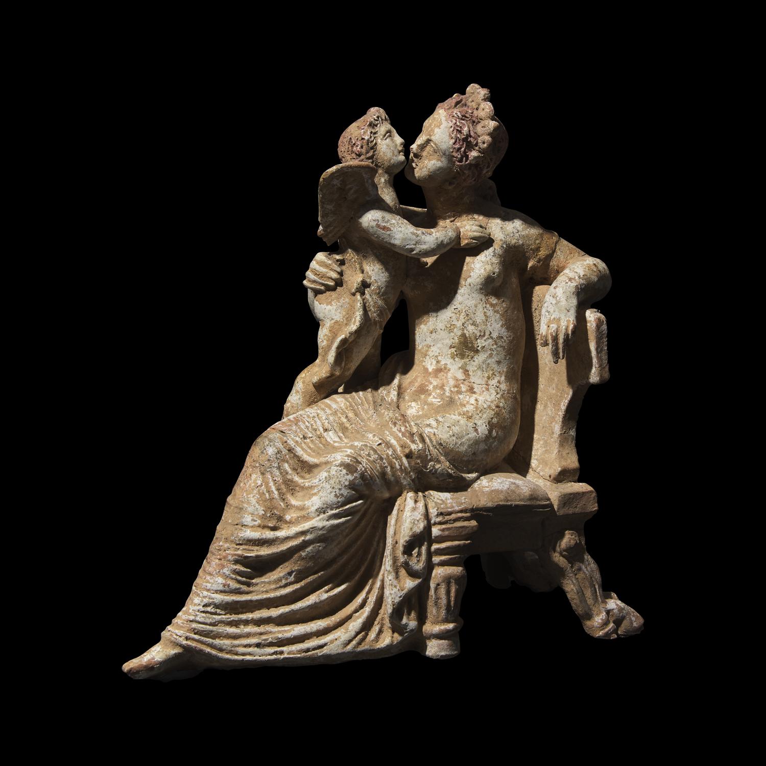 A Neoclassical Terracotta Venus with Eros