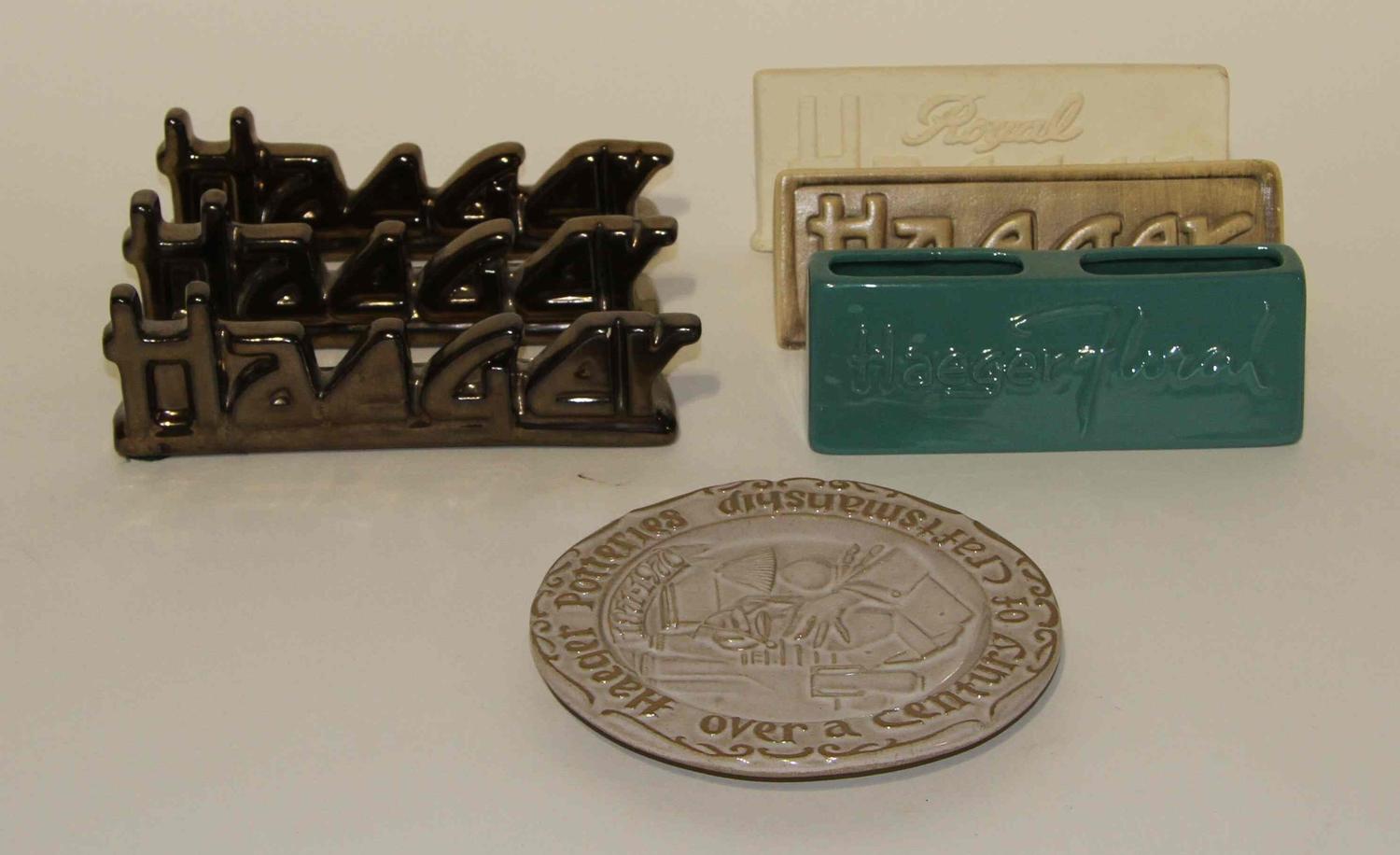 A Group of Seven Haeger Pottery Advertising Articles Width of widest 8 3/4 inches.