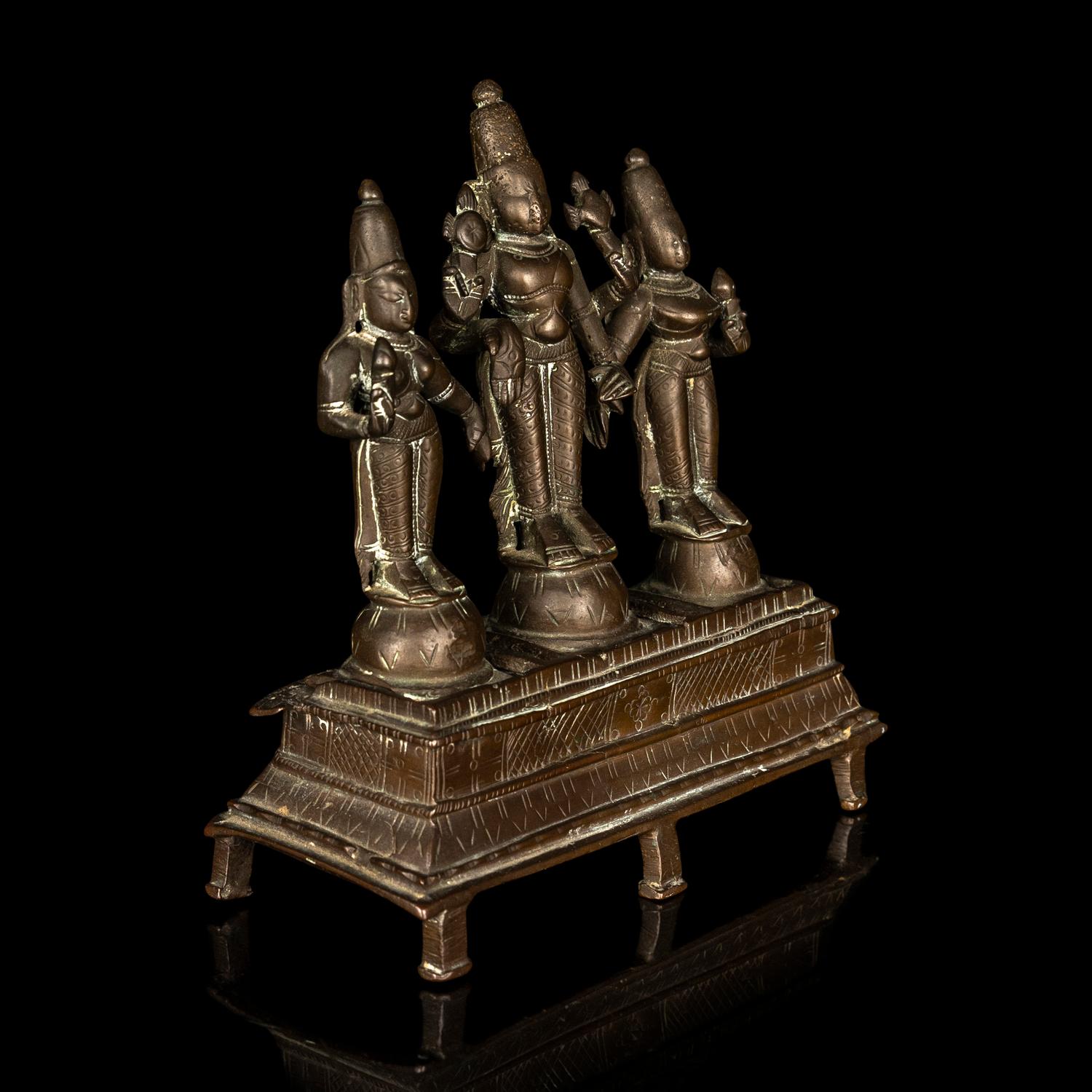 An Indian Bronze Statue of Vishnu with Sridevi and Bhudevi