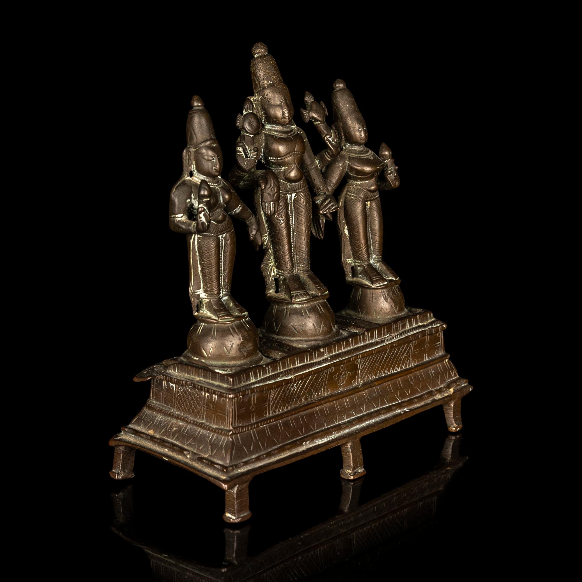 An Indian Bronze Statue of Vishnu with Sridevi and Bhudevi