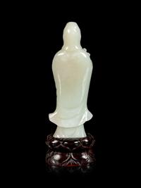 A Pale Celadon Jade Figure of Guanyin