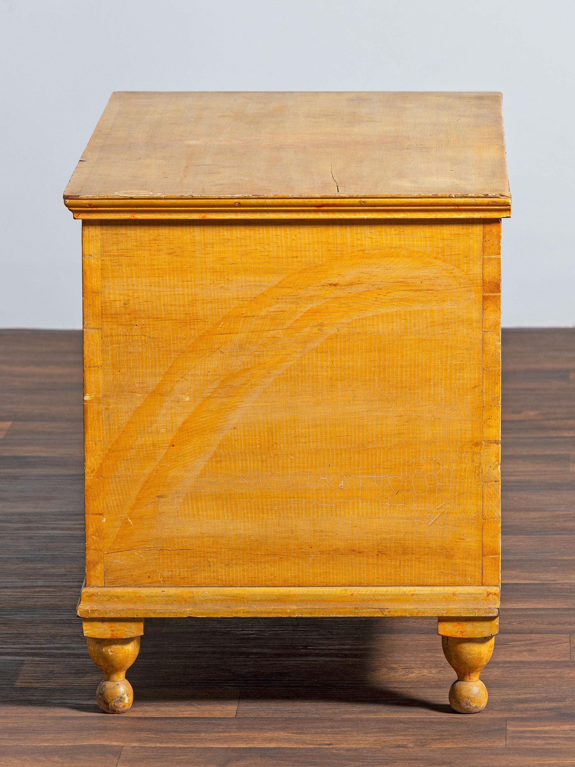 A Country Yellow and Red Paint Decorated Pine Blanket Chest