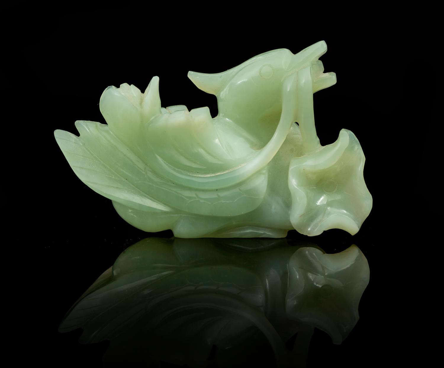 A Carved Jade Toggle Length 3 7/8 inches.
