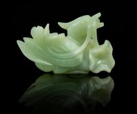 A Carved Jade Toggle Length 3 7/8 inches.