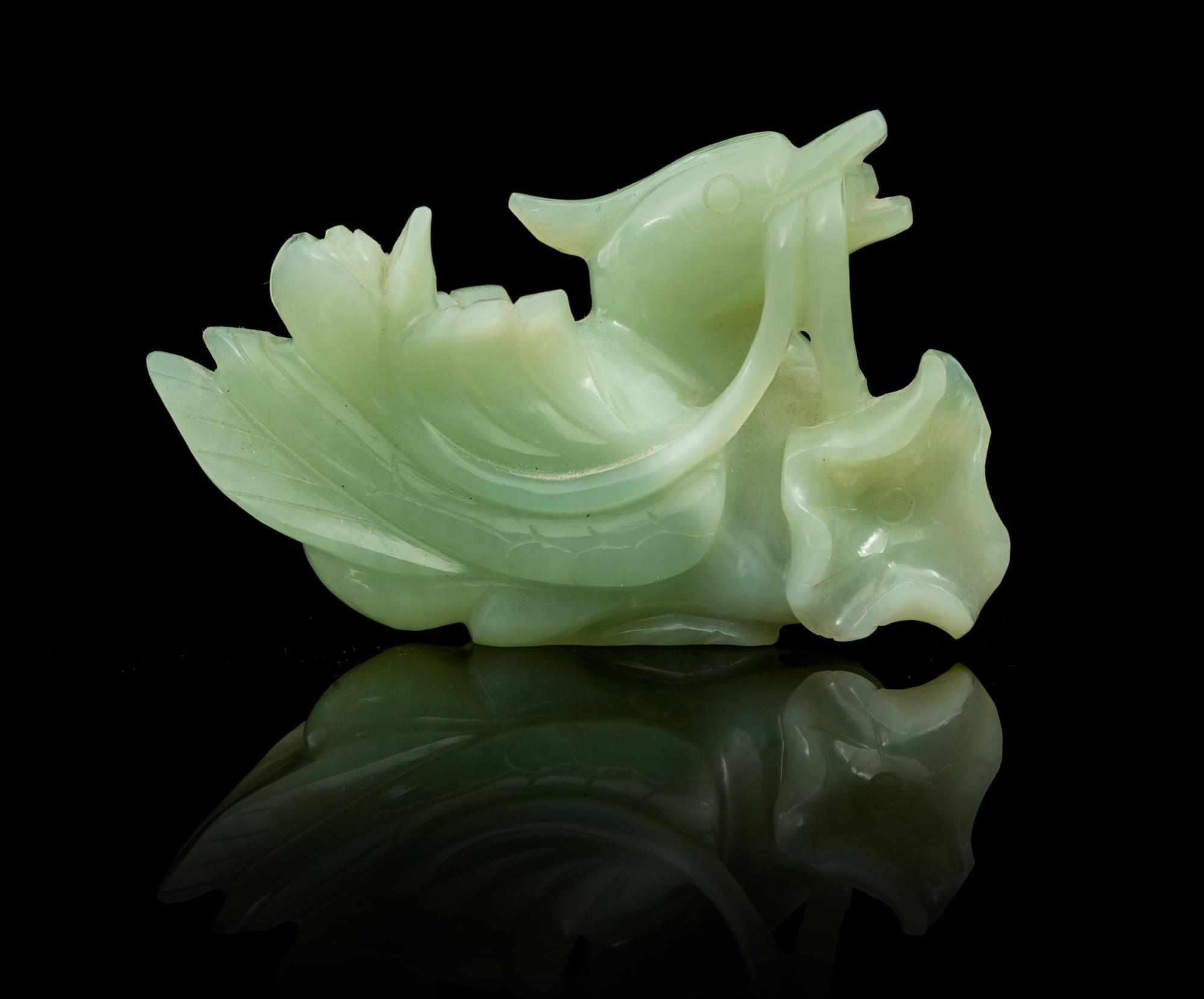 A Carved Jade Toggle Length 3 7/8 inches.