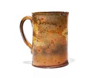 A Glazed and Slip-Decorated Redware Mug