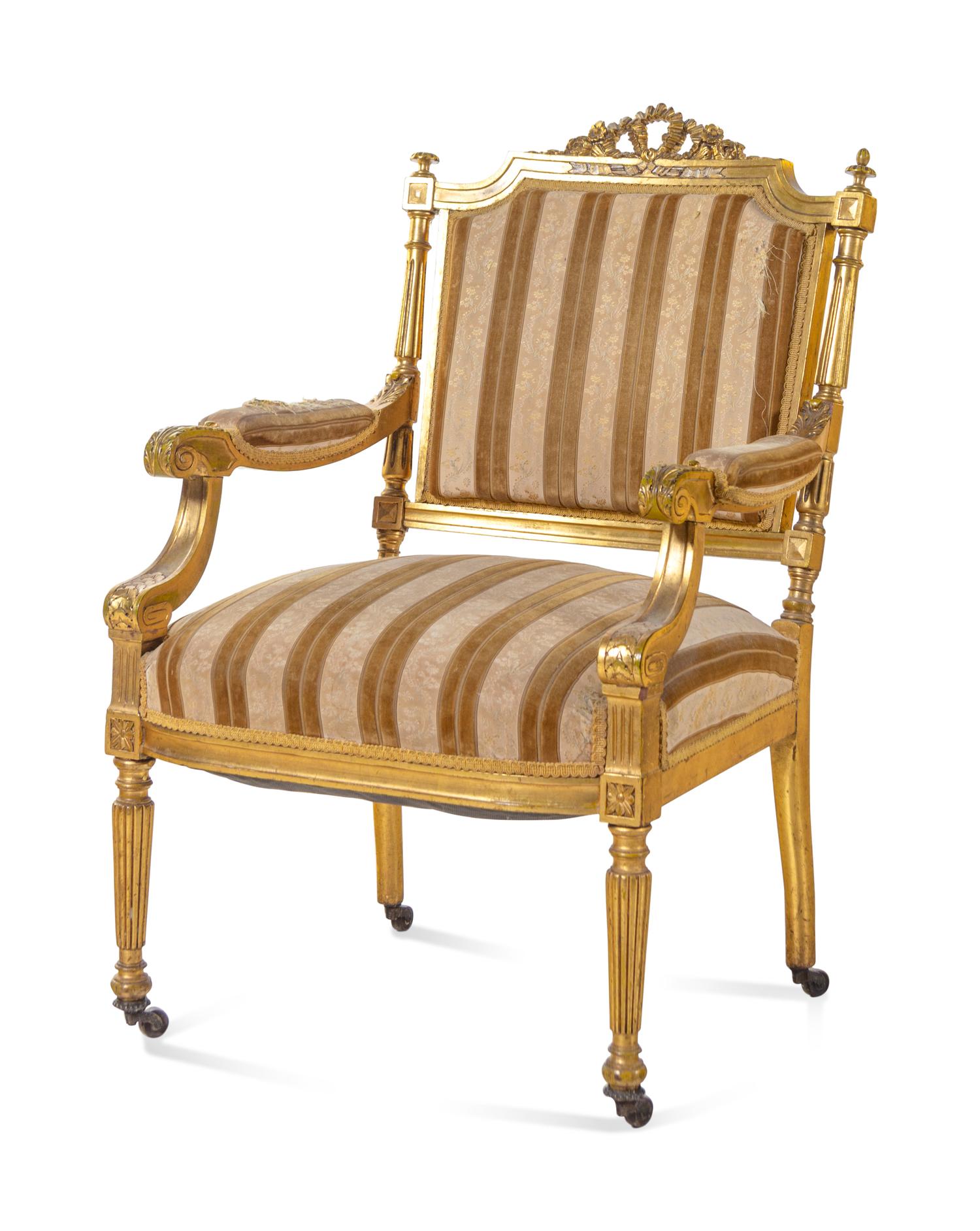 A Louis XVI Style Carved Giltwood Settee and Fauteuil