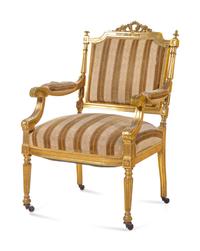 A Louis XVI Style Carved Giltwood Settee and Fauteuil