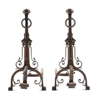 A Pair of English Arts and Crafts Iron Andirons