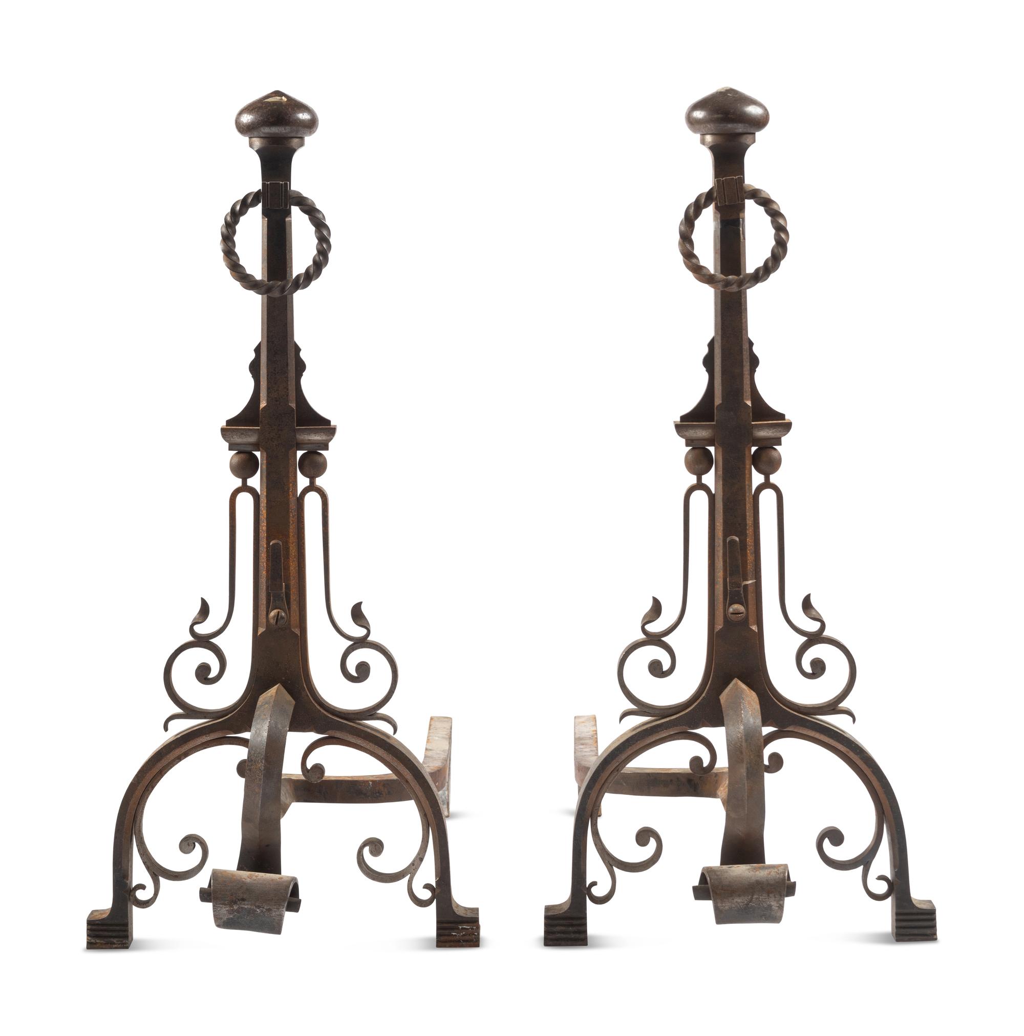 A Pair of English Arts and Crafts Iron Andirons
