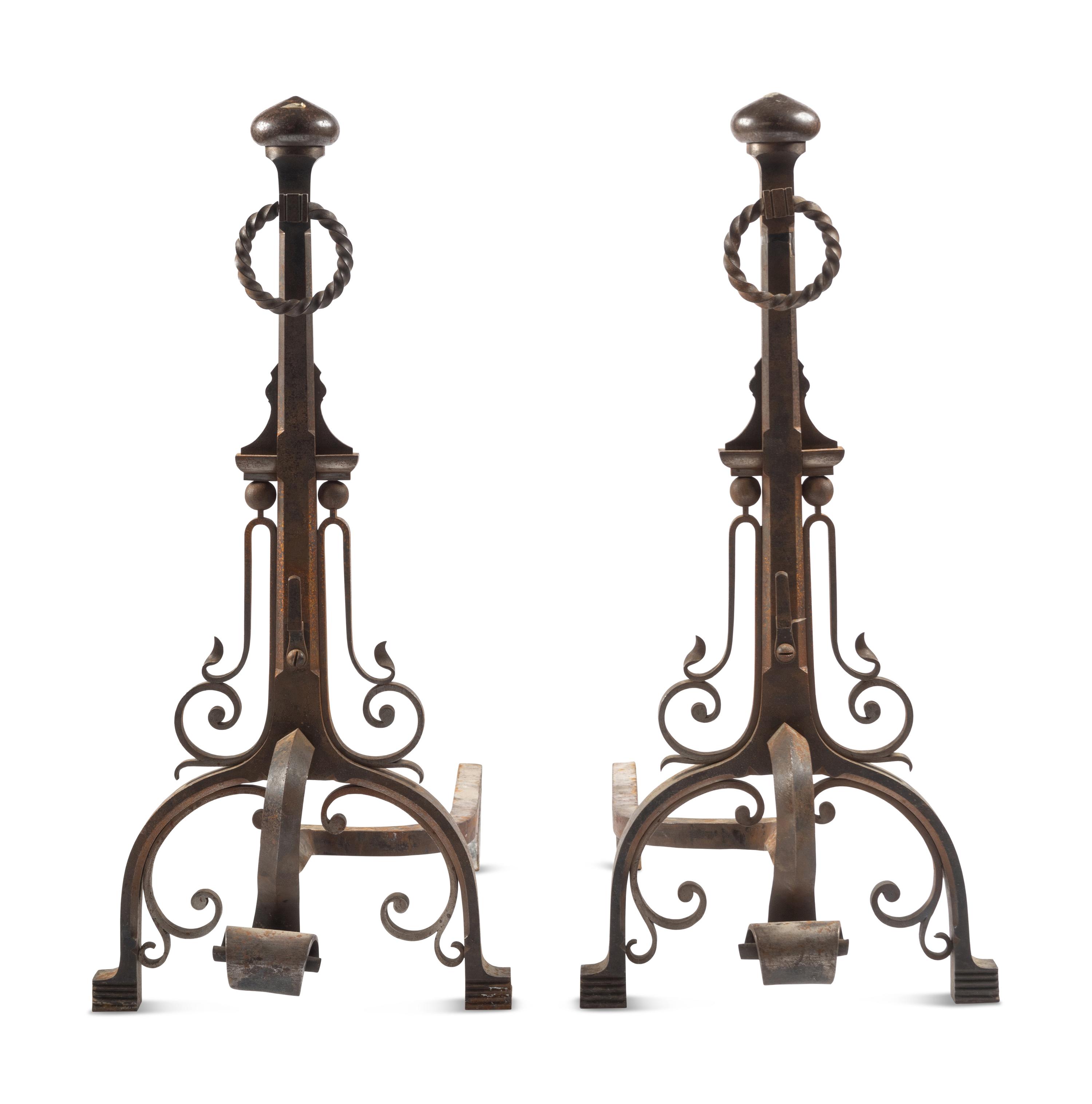 A Pair of English Arts and Crafts Iron Andirons
