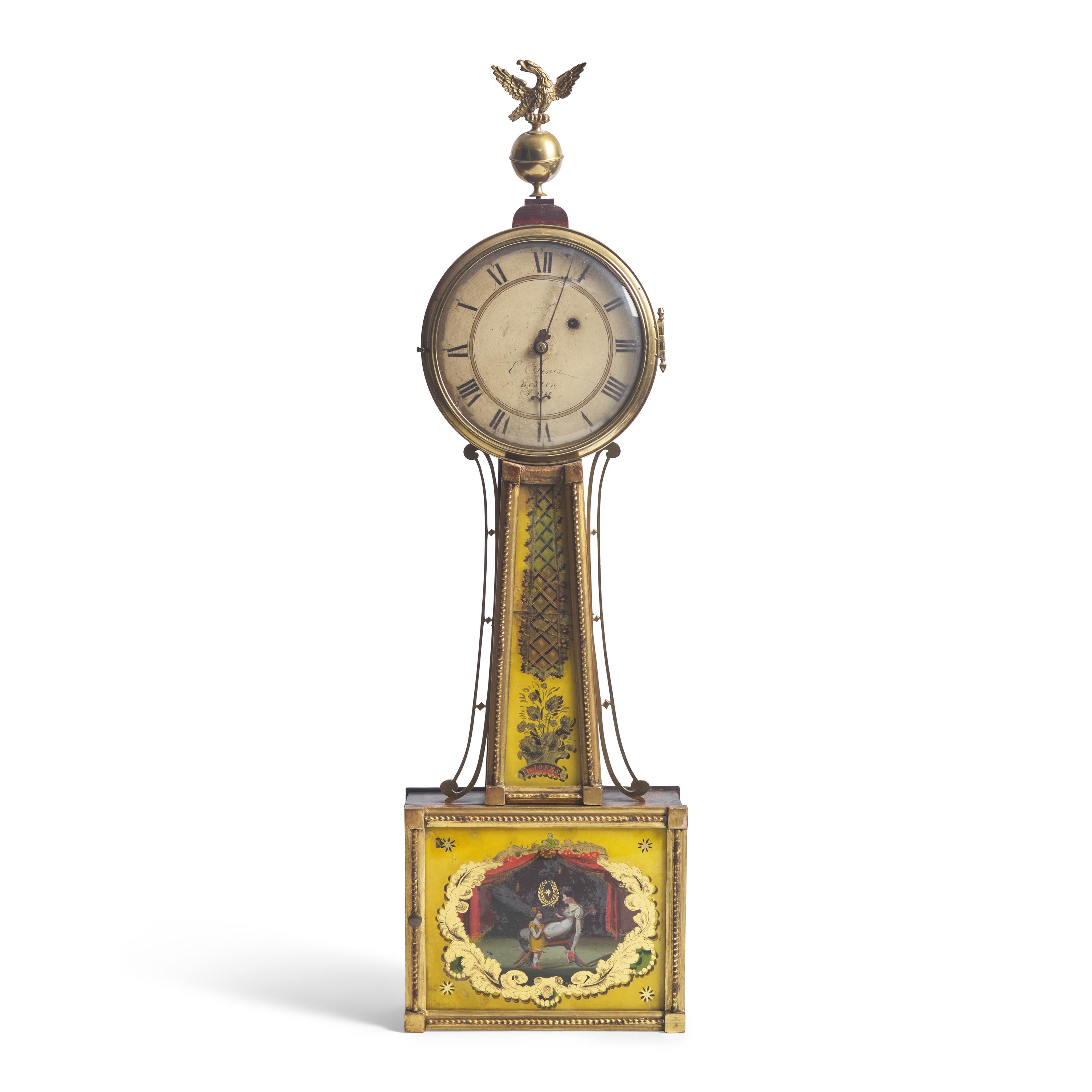 A Classical Parcel-Gilt, Brass-Mounted and Eglomise-Panel Inset Banjo Clock