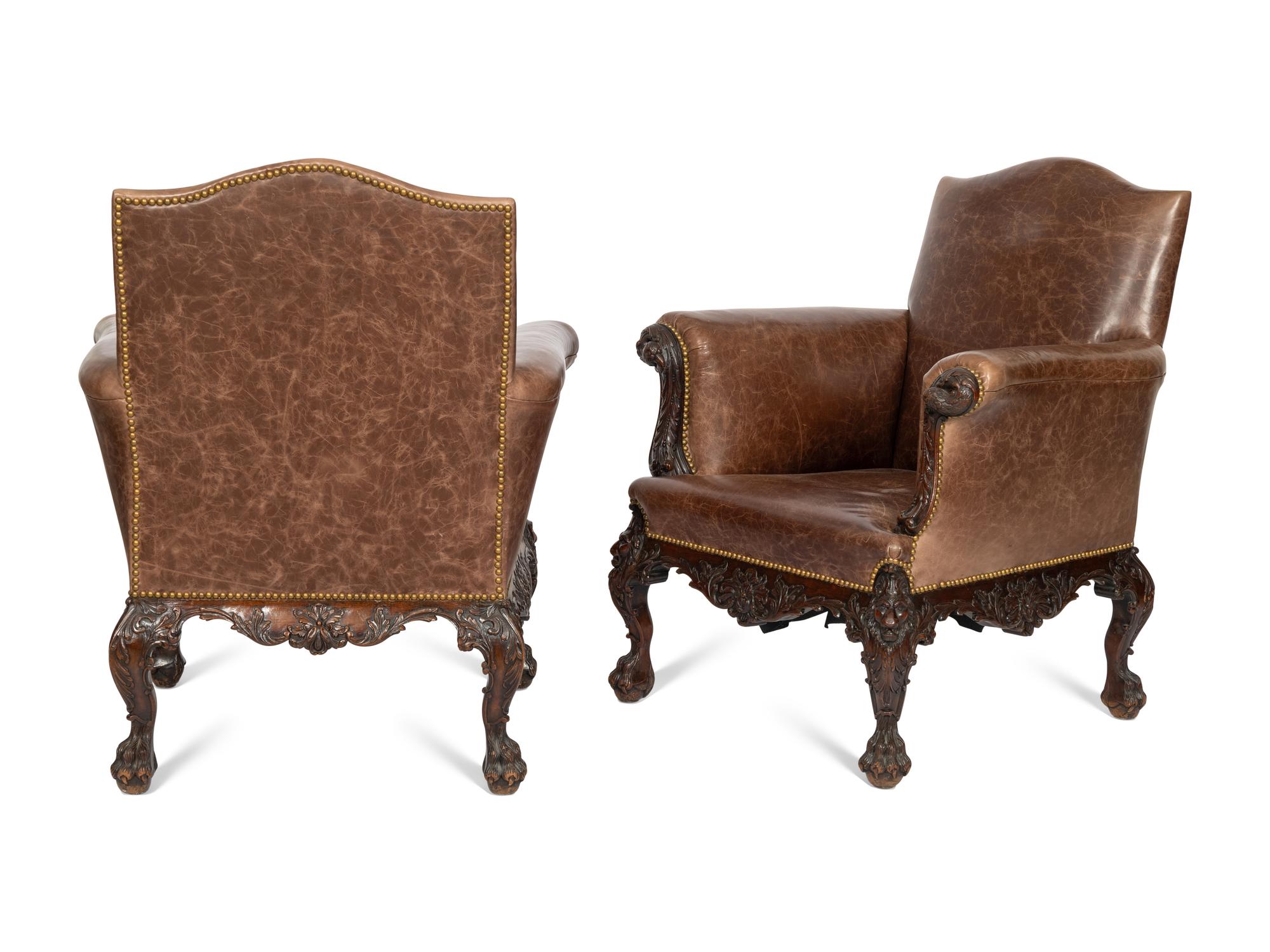 A Pair of Victorian Mahogany and Leather Upholstered Armchairs