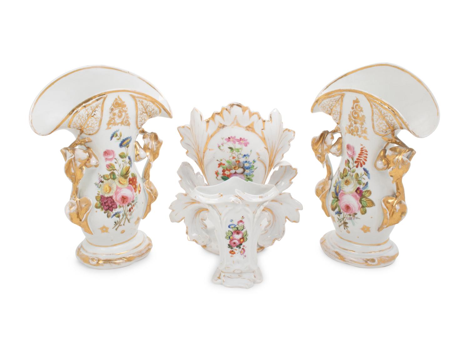 A Group of French Painted and Parcel Gilt Porcelain Articles