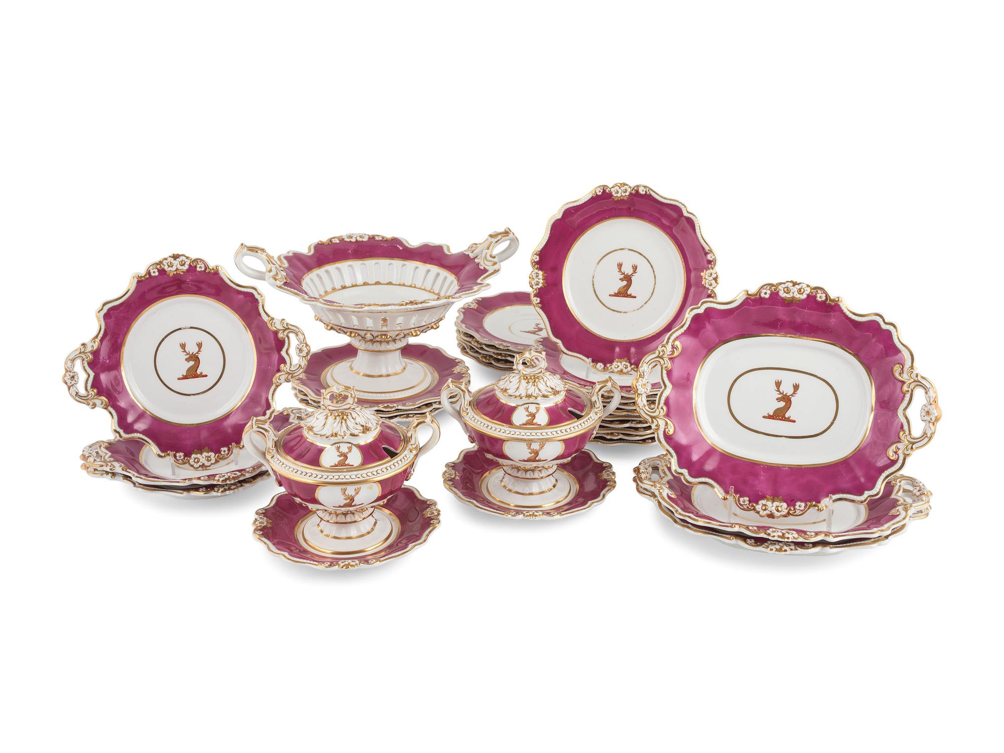 An English Parcel-Gilt and Puce Decorated Porcelain Dinner Service