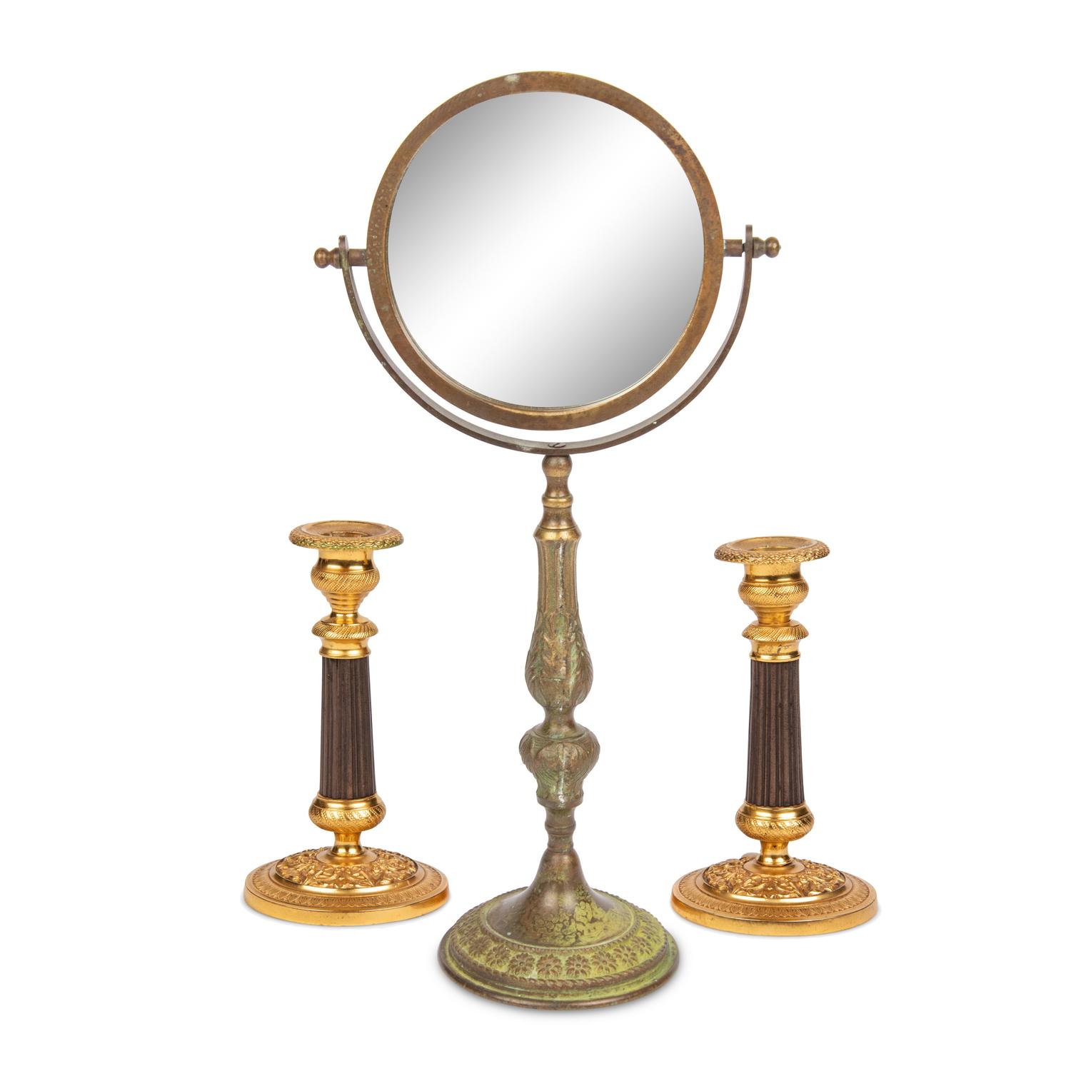 A Pair of Gilt Metal Mounted Candlesticks