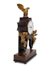 An Austrian Ebonized and Burlwood Mantel Clock with Gilt Metal and Giltwood Mounts