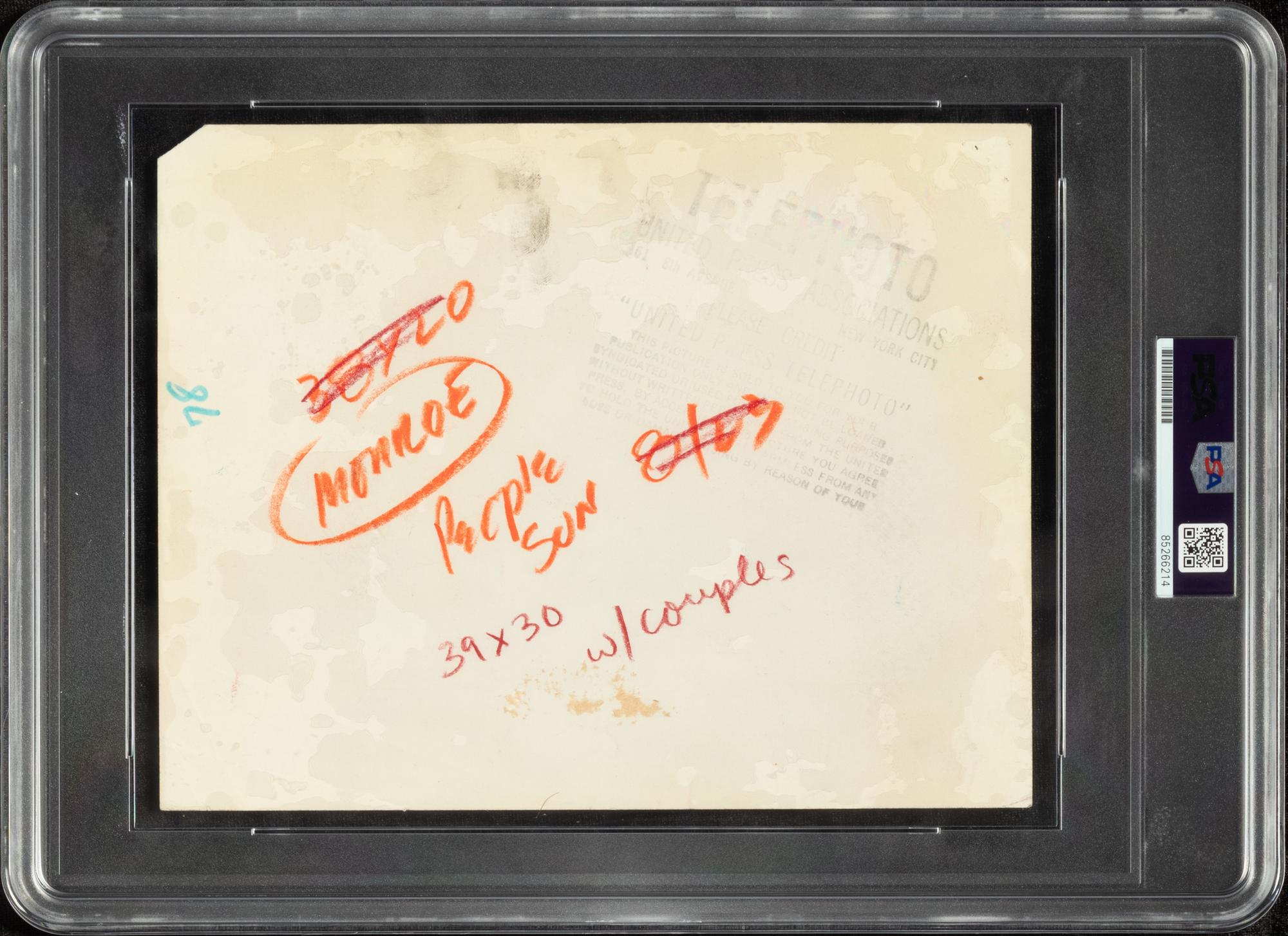 An Original Joe DiMaggio and Marilyn Monroe Wedding Day News Photograph (PSA Type III Authentic)
