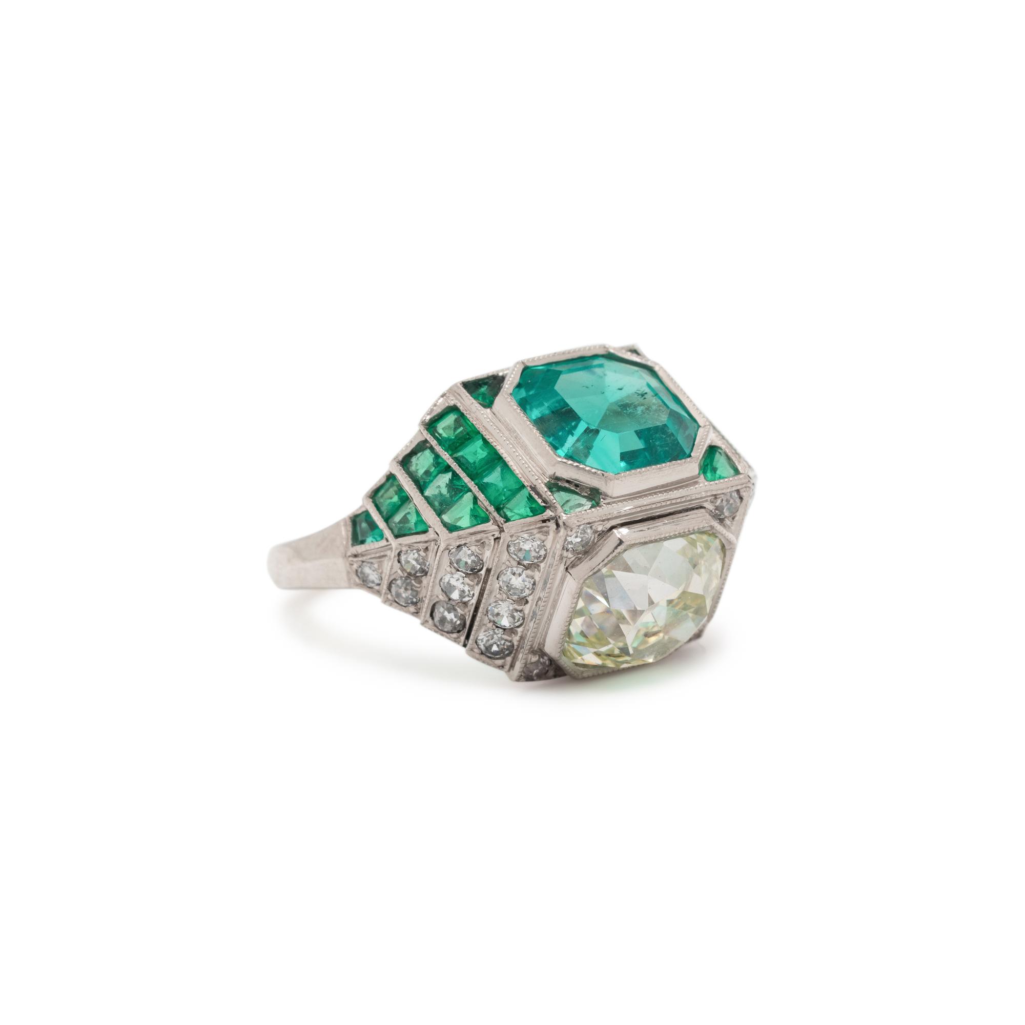 ART DECO, EMERALD AND DIAMOND SCULPTURAL 'TOI ET MOI' RING