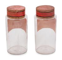 A Pair of Clear Glass Apothecary Jars