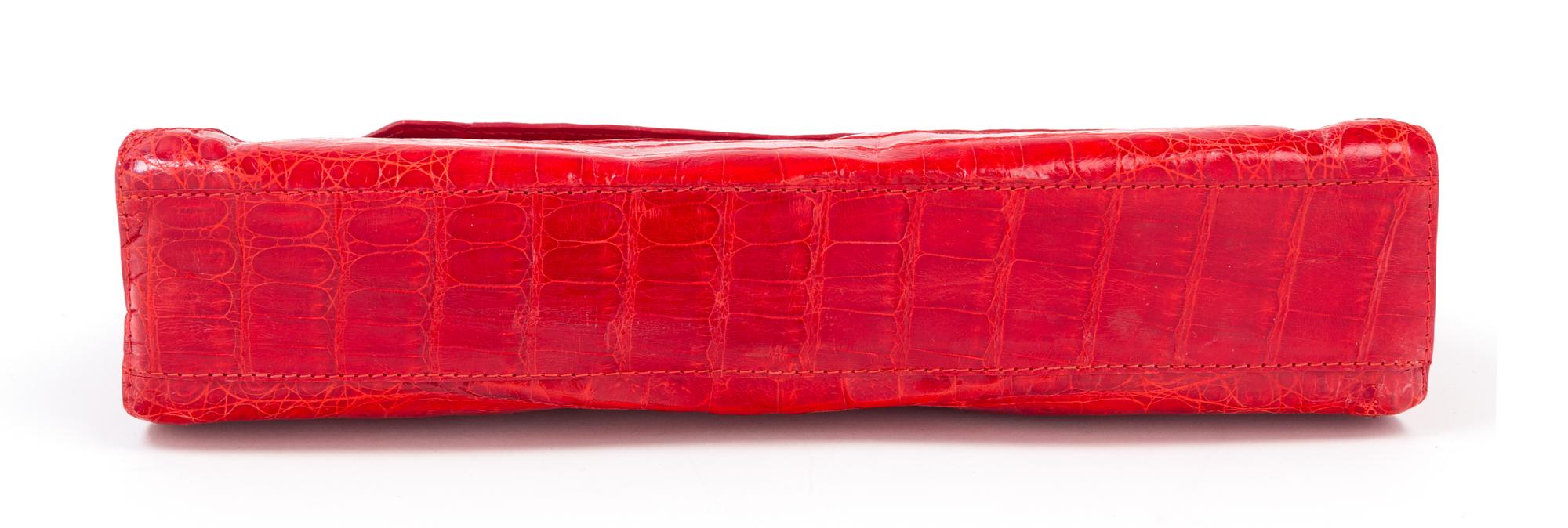 A Nancy Gonzalez Red Crocodile Clutch, 10.75" x 4.5" x 2".