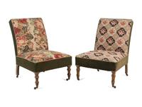 A Pair of Victorian Oak Slipper Chairs with Needlepoint Seats