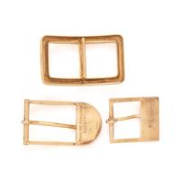 COLLECTION OF YELLOW GOLD BELT BUCKLES