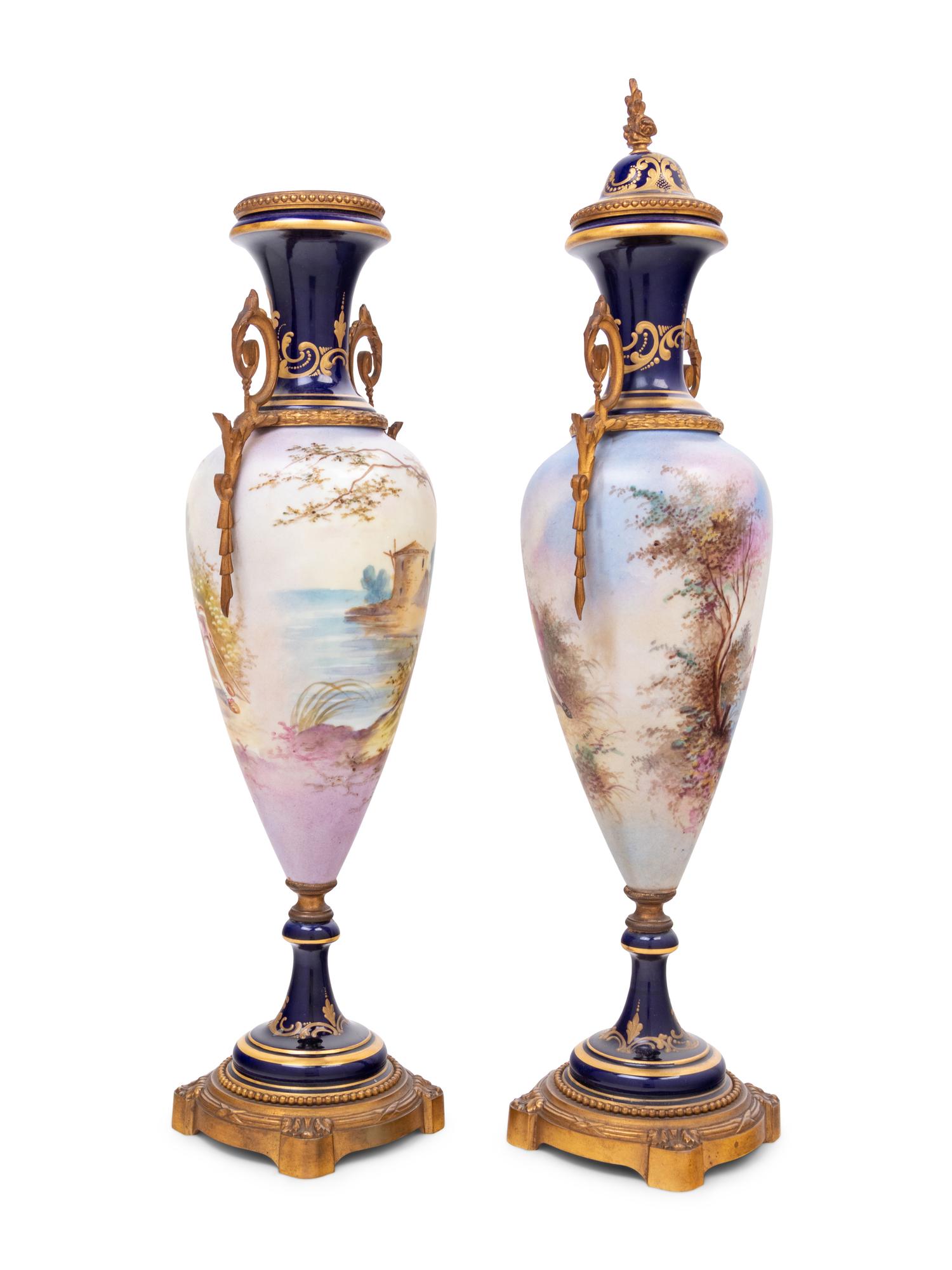 A Pair of Sèvres Style Gilt Metal Mounted Porcelain Urns