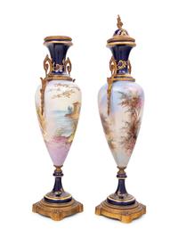 A Pair of Sèvres Style Gilt Metal Mounted Porcelain Urns